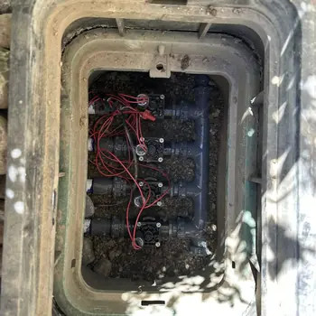Multi-zone valve assembly serviced inside a valve box